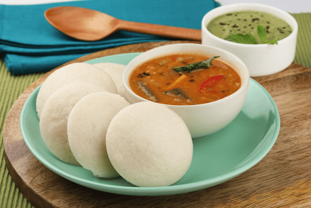 four-idlies-served-in-plate-with-sambhar