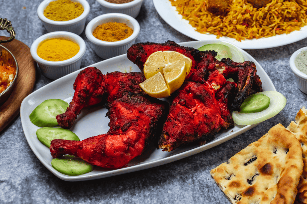 Tandoori Chicken with Lemon on top | What to Expect at an Indian Buffet | The Ultimate Guide to Indian Buffets: Tips for Making the Most of Your Experience | Darbar Wenty